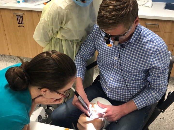 Dr Lincoln Harris performs dentistry